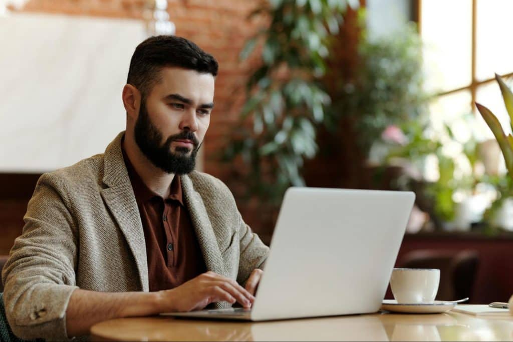 A man using laptop for work