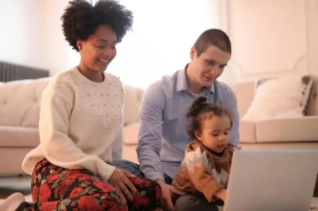 A man and woman together with their baby