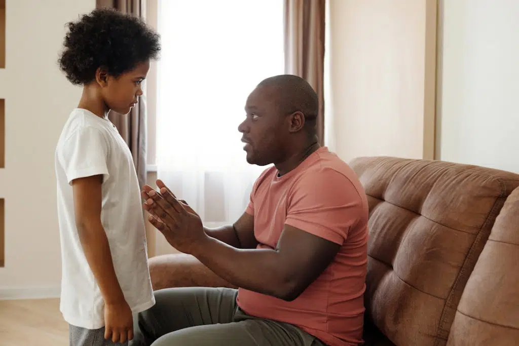 A man teaching  his son