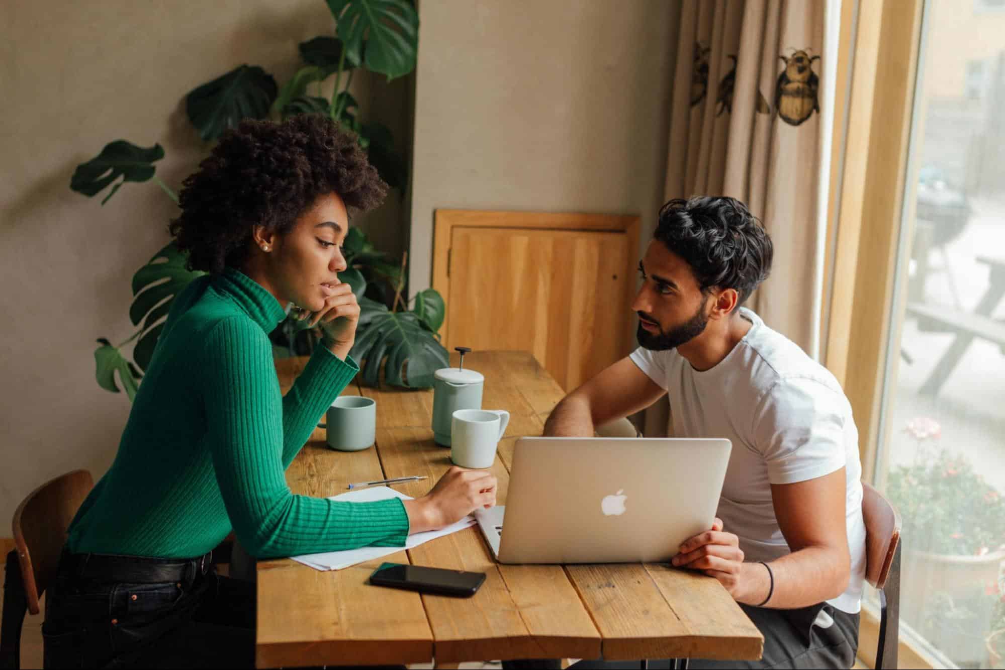 A man and woman talking about their plan
