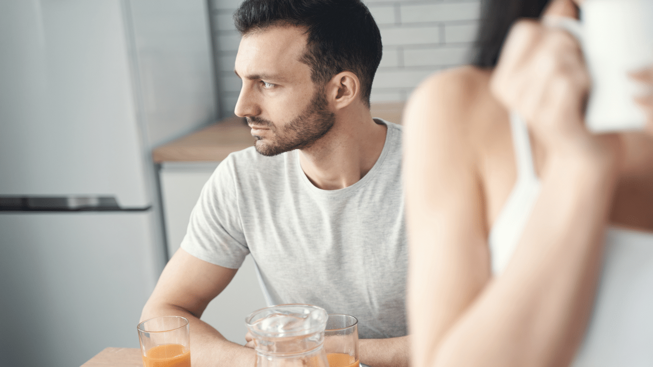A man looking pensive during breakfast