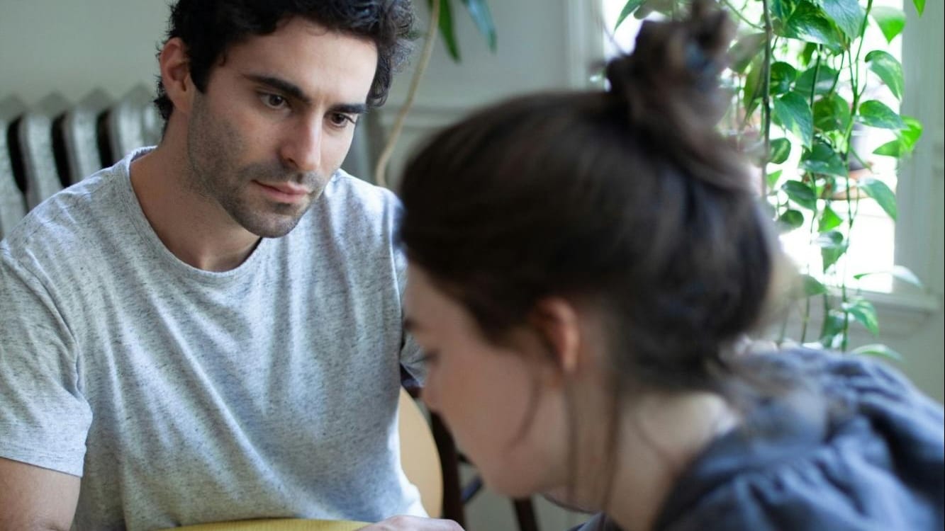 A man staring at the woman