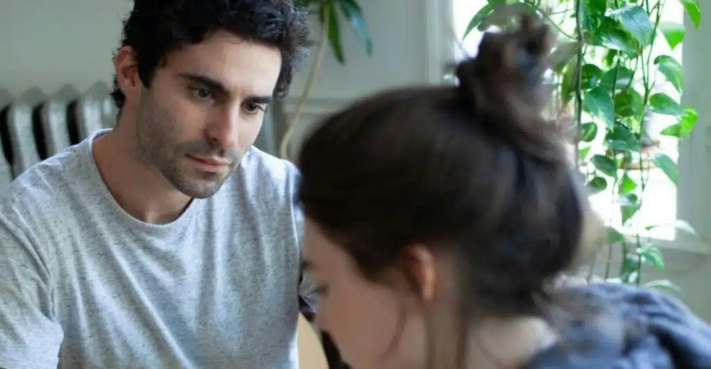 A man staring at the woman