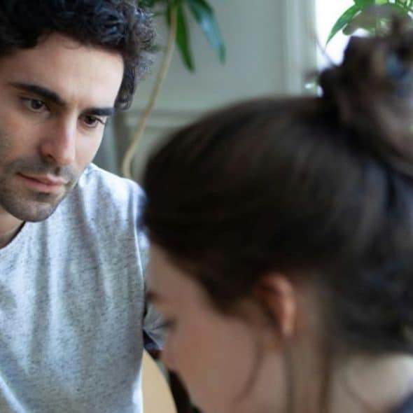A man staring at the woman
