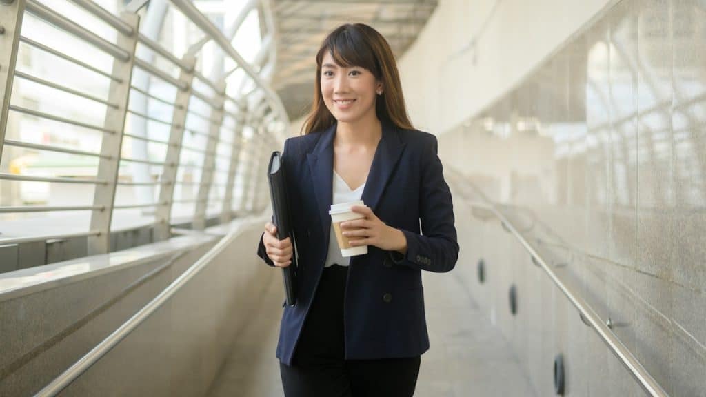 Portrait of a beautiful young Asian businesswoman working in a modern city.