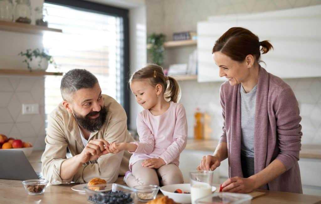 A man and woman having a bond with their child