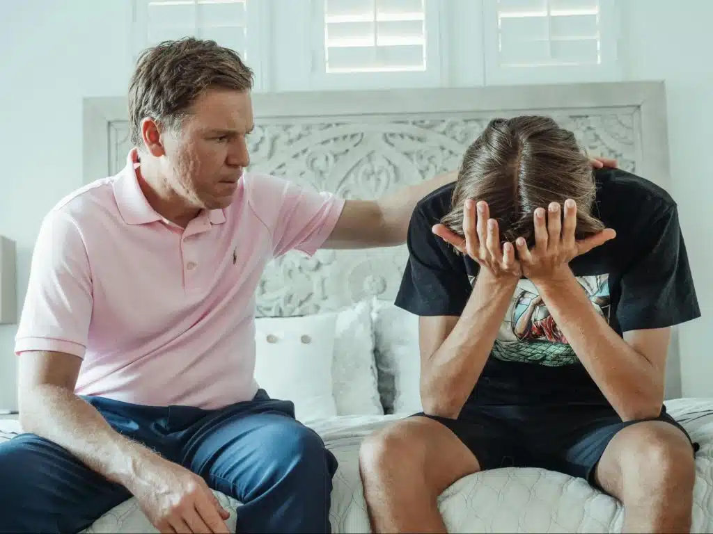 A father correcting his child 
