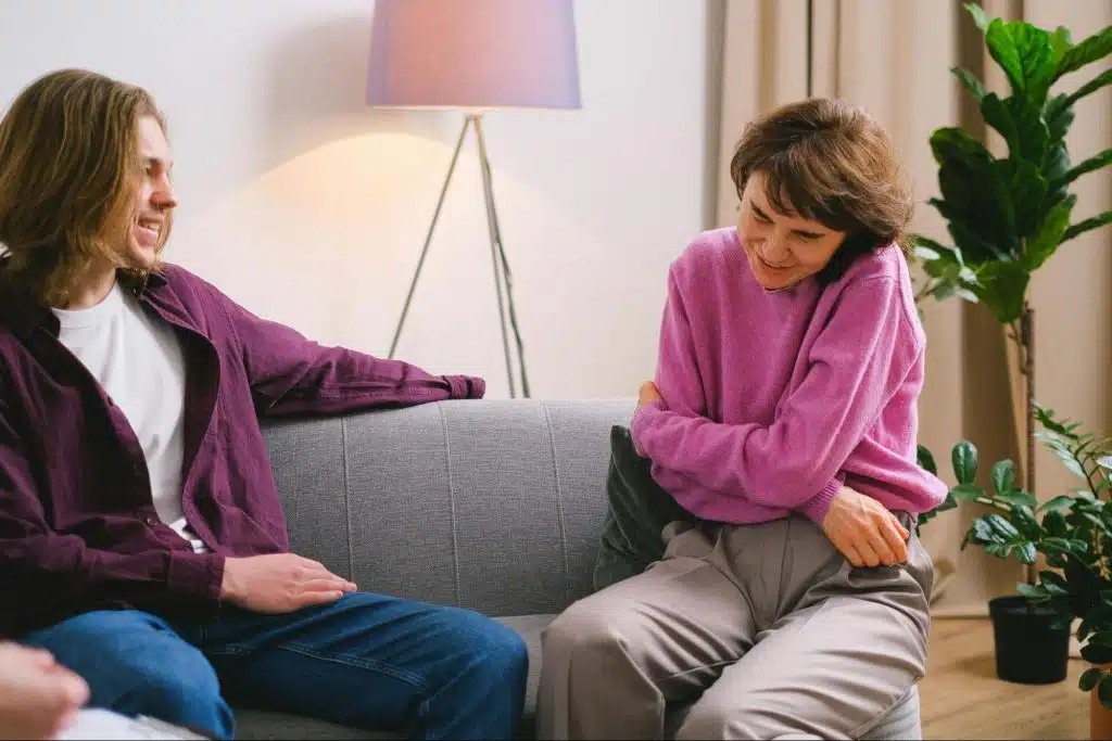 A man and woman talking