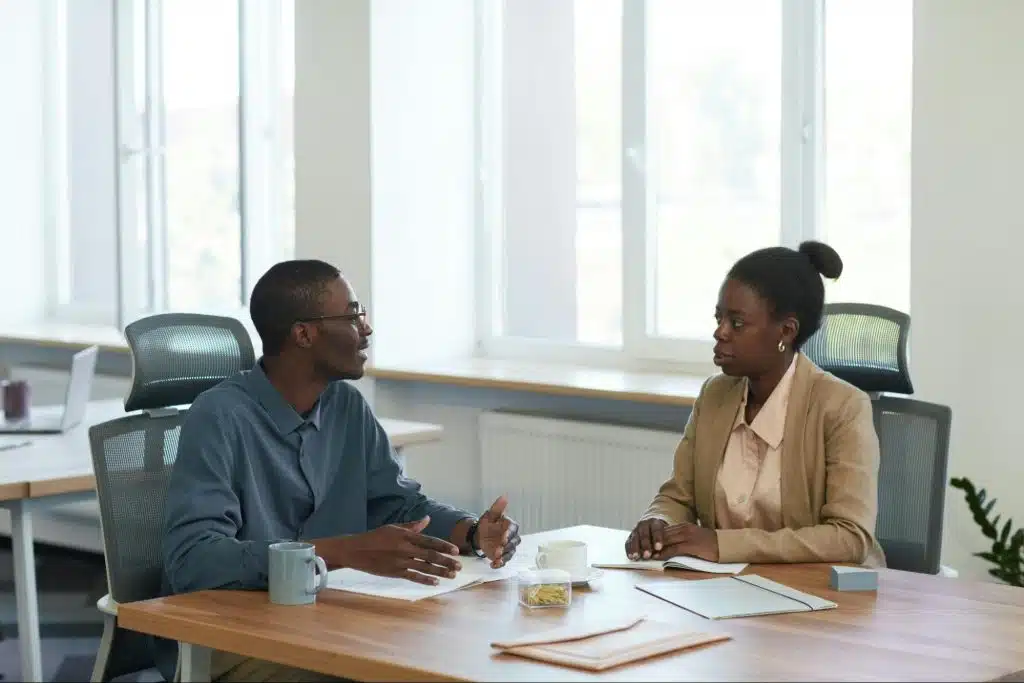 A man and woman talking