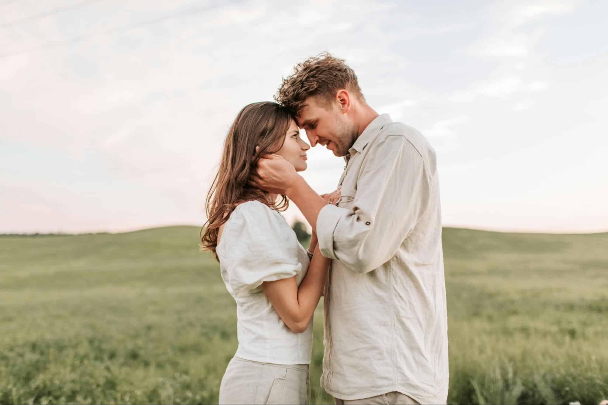 A man and woman facing each other