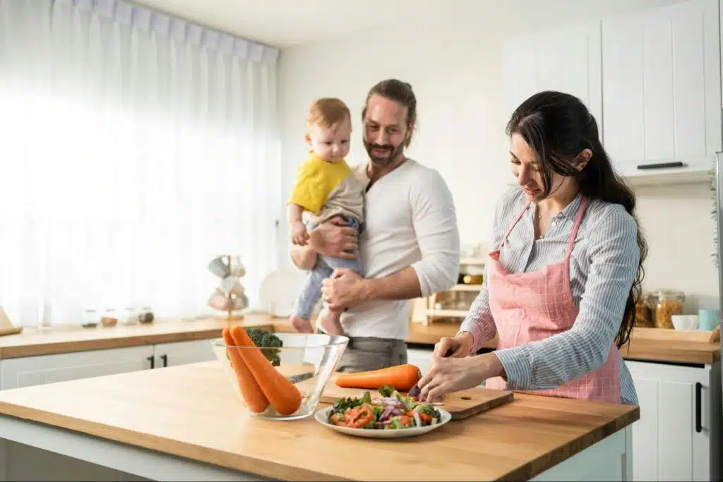 A man and woman at the kitchen