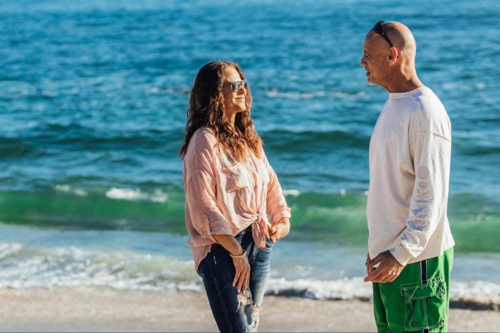 A man and woman talking 