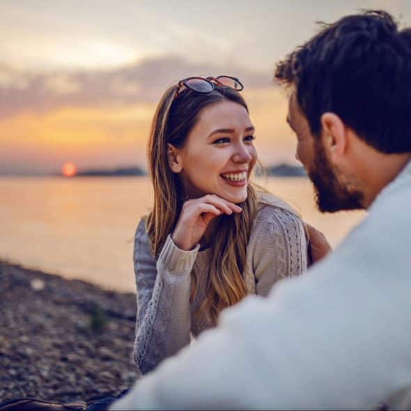 A man and woman talking