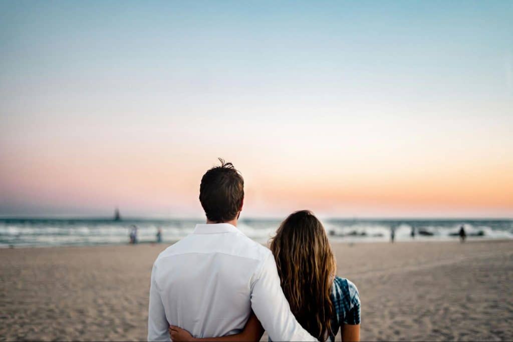 A man and woman at the beach