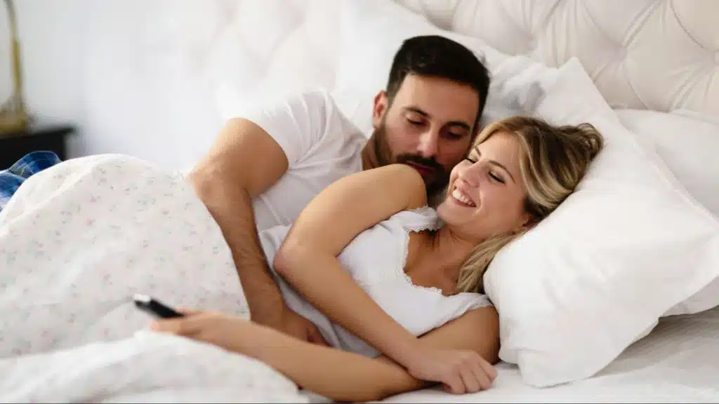 A man hugging a woman
