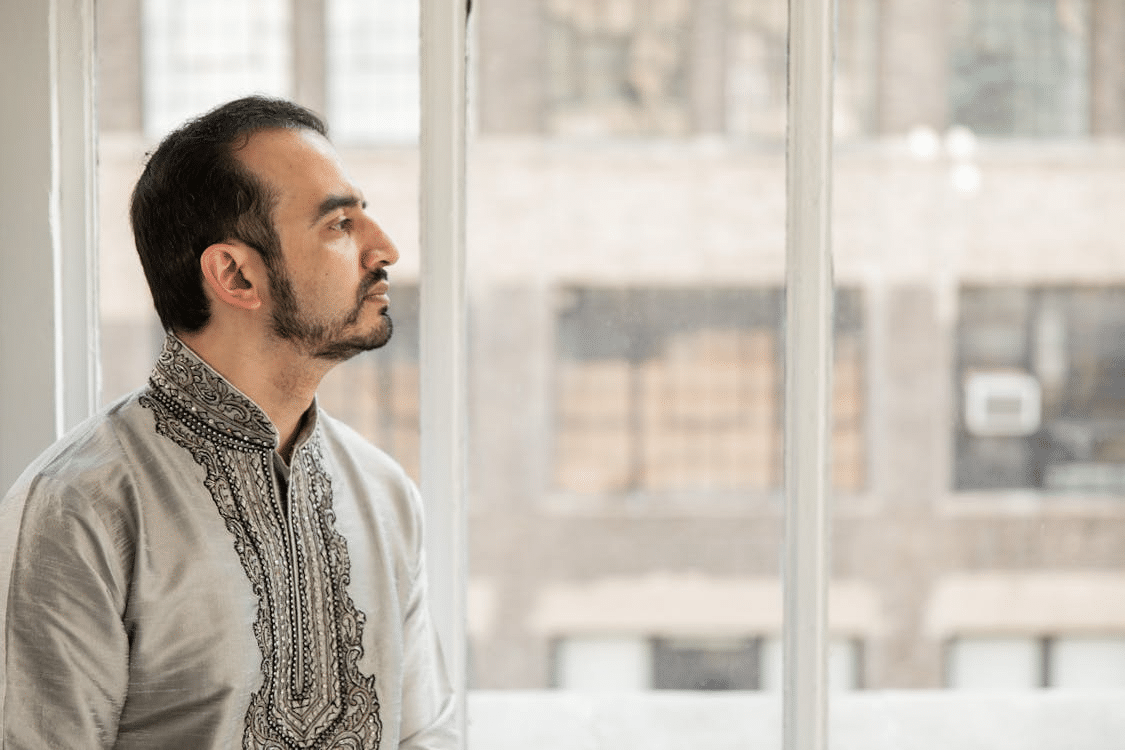 A man looking outside the window