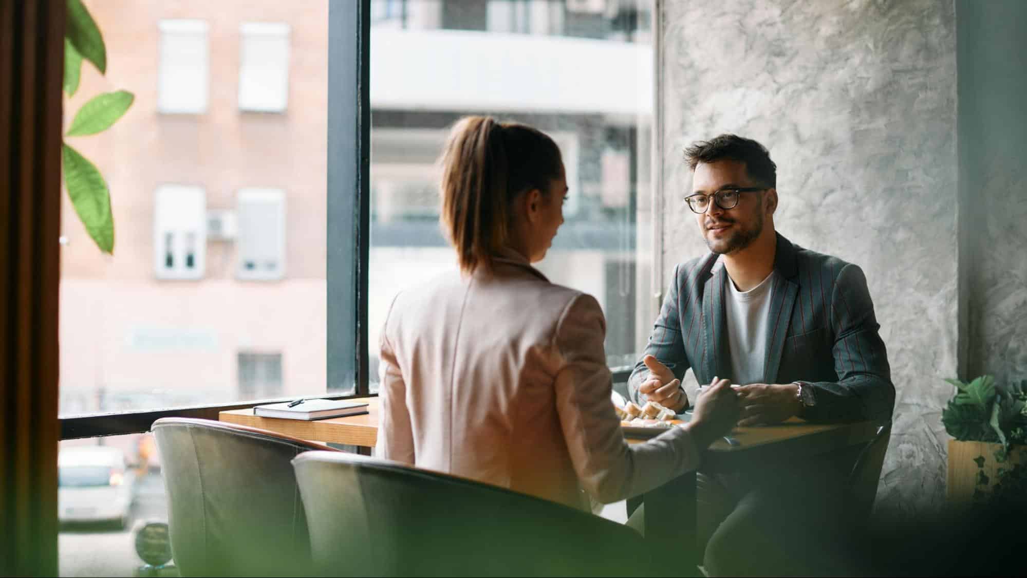 A man and woman talking