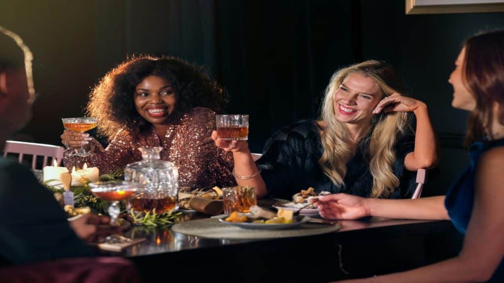 Female friends having dinner together