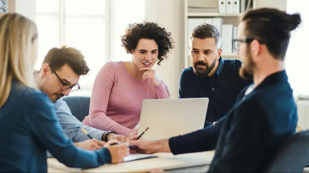 A man with his colleagues 
