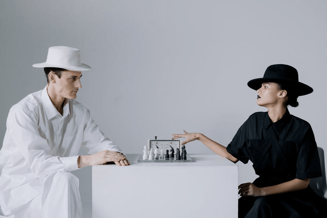 Two people playing chess