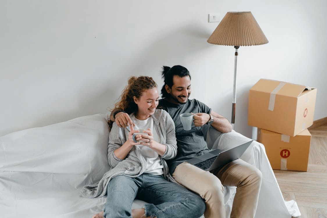A couple sitting on a couch