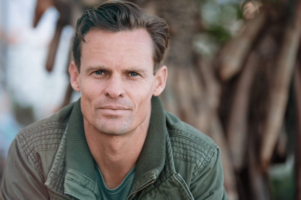 A man in green jacket