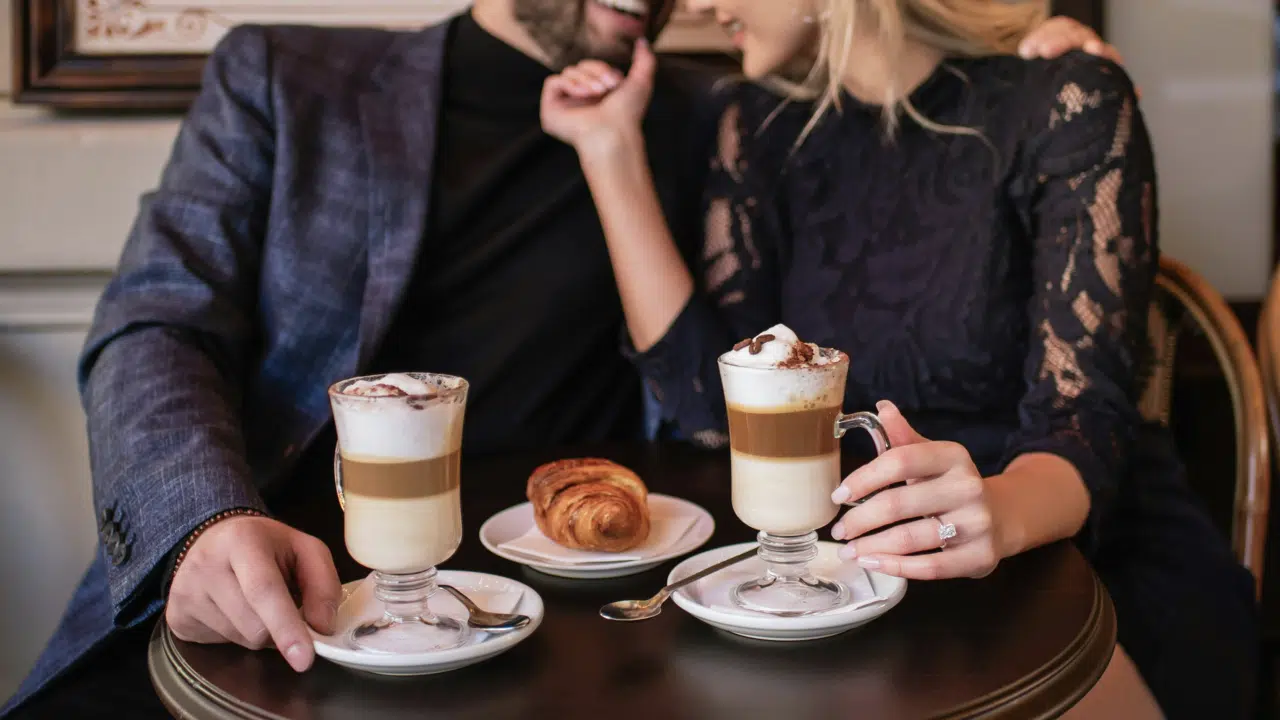 A couple having dessert together