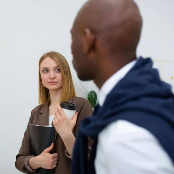 A man and woman looking at each other