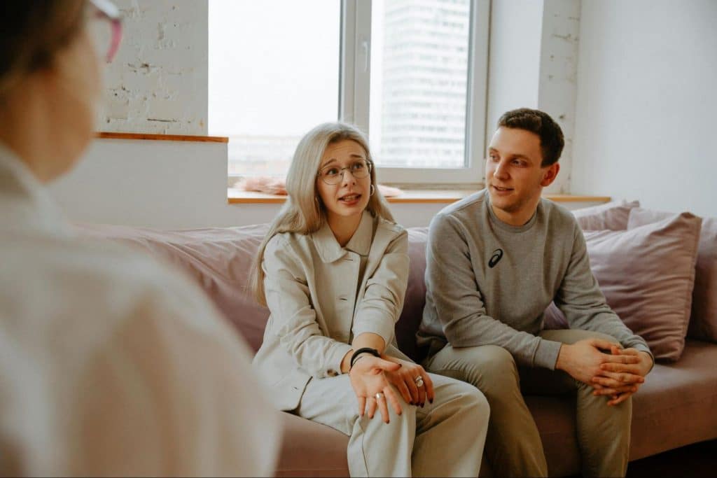 A man listening to woman