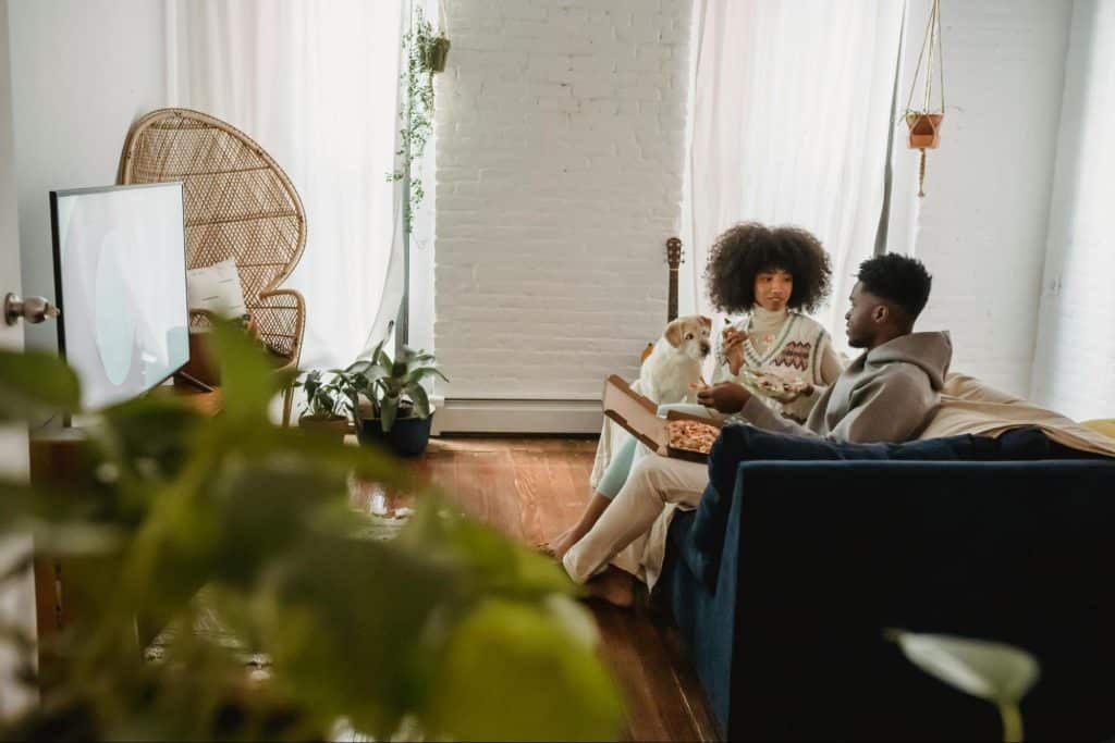 A man and woman at the couch