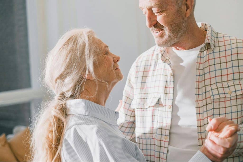 A man and woman facing each other