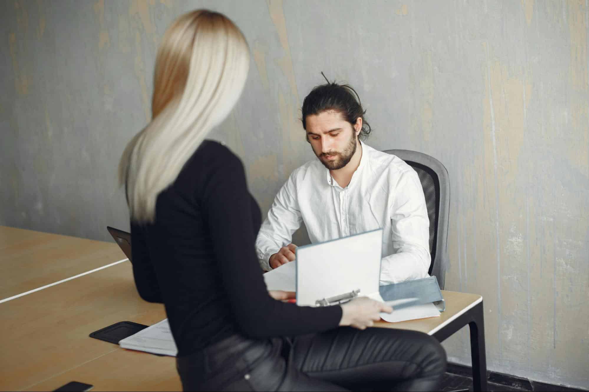 A man ignoring a woman