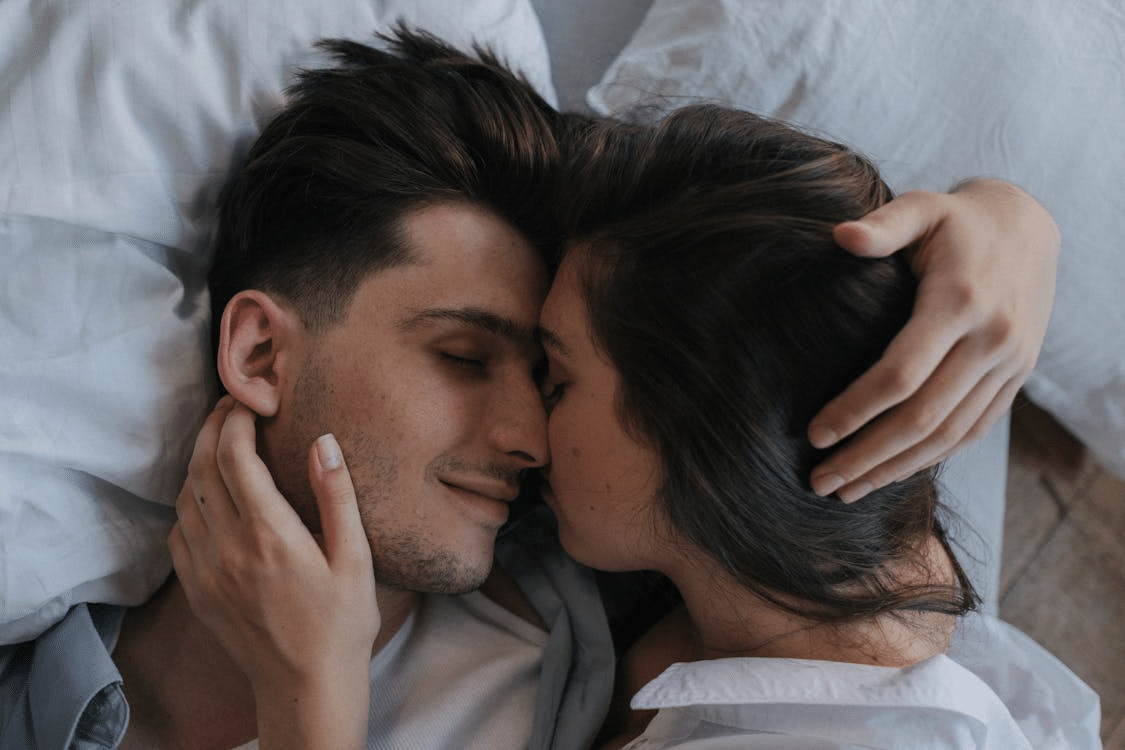 A man and a woman on the bed