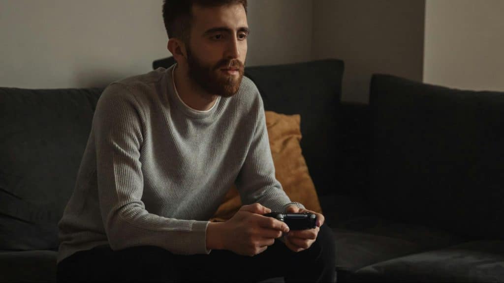 A man playing a video games