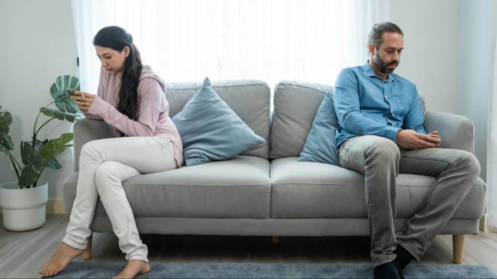 A man and woman not talking to each other