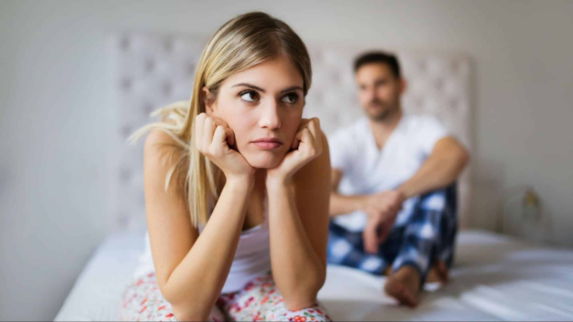 A man waiting for a sulking woman