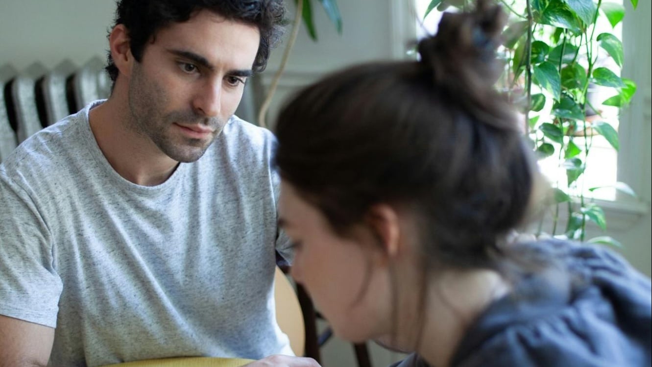 A man staring at the woman