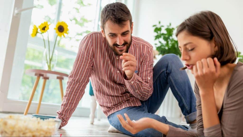 A man talking to woman 