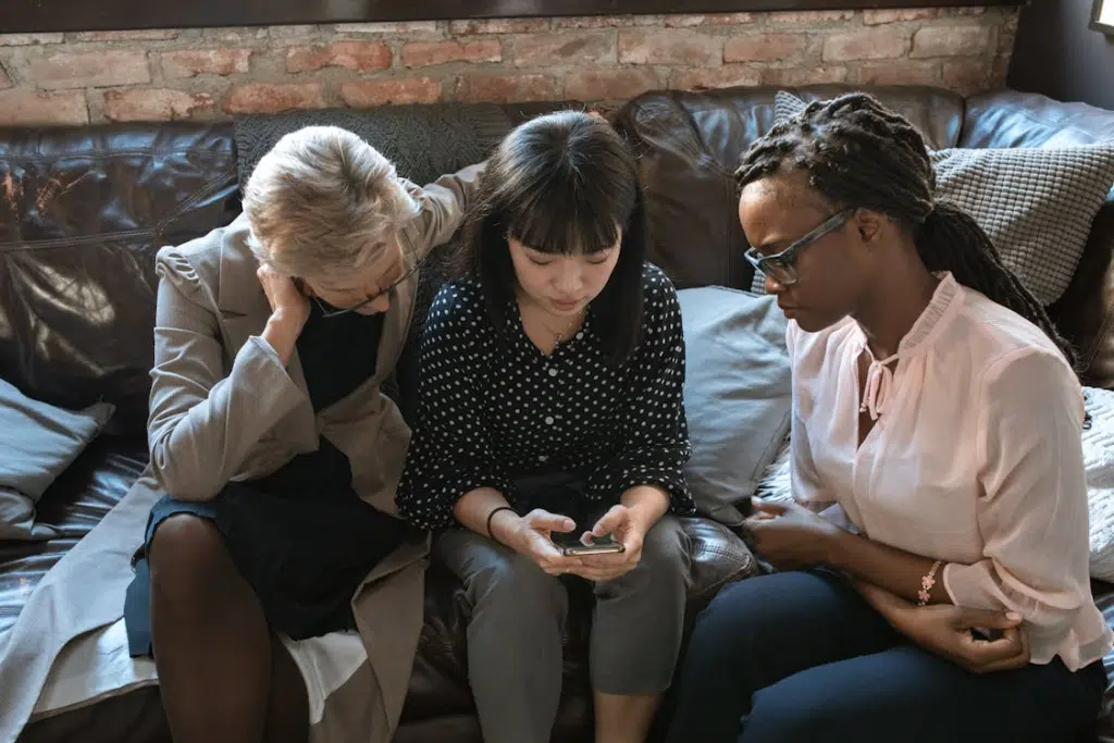 Group of Friends looking at smartphone