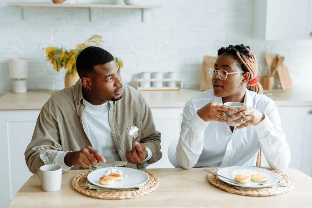 A man asking something to woman