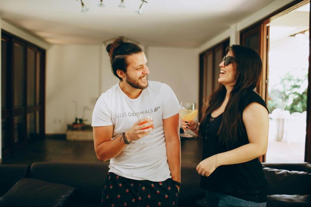 A man and woman laughing together