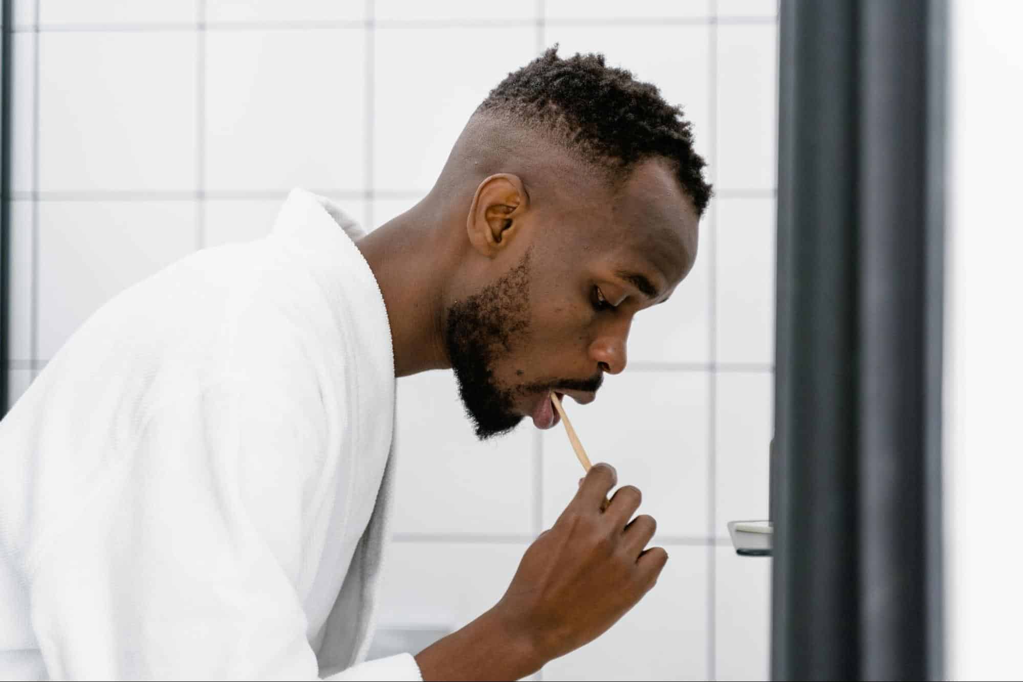 A man brushing teeth