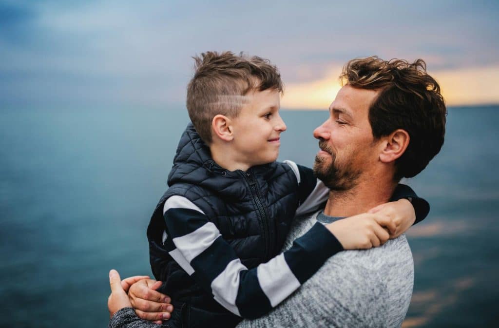 A father and son looking at each other
