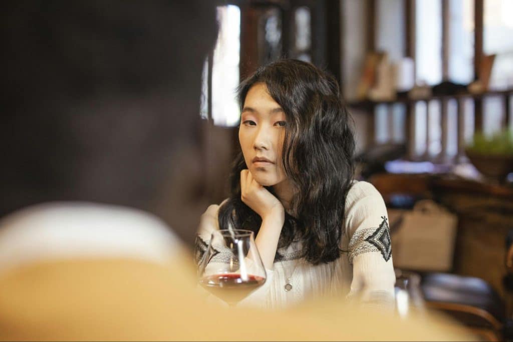 A woman looking at the man 
