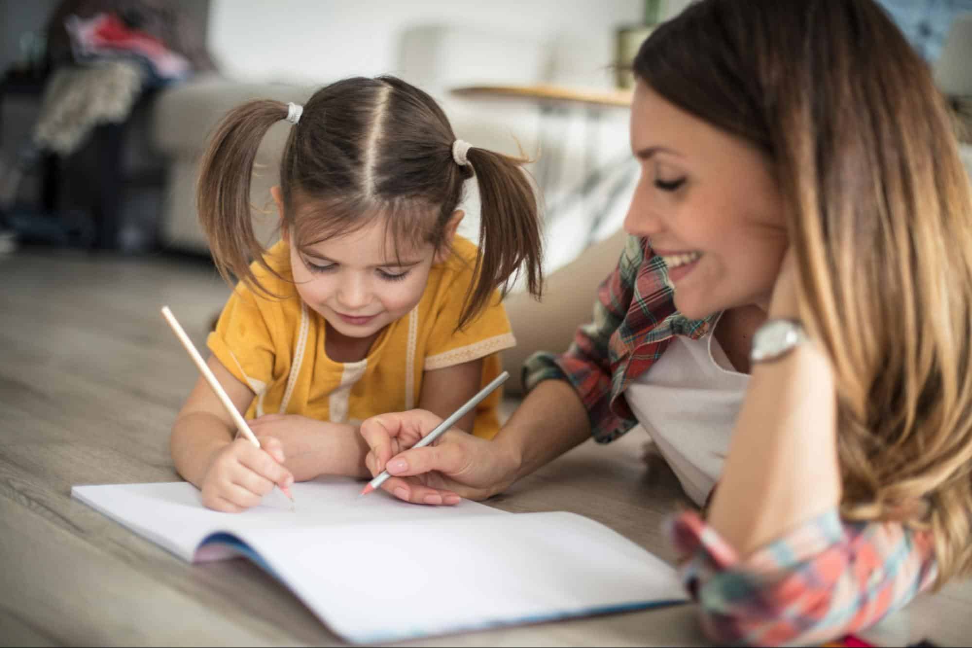 A woman teaching her child