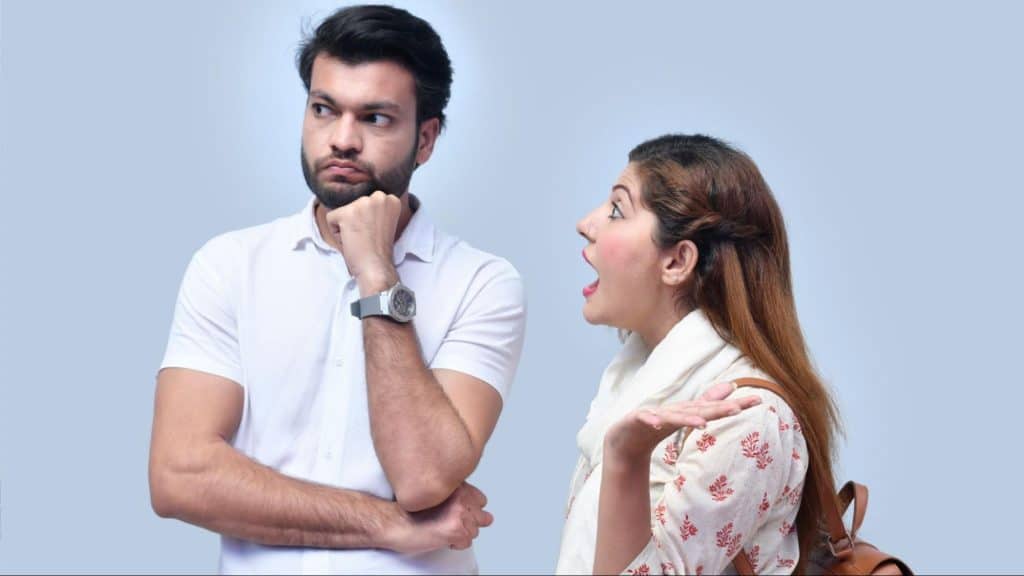 A man upset with a loud woman