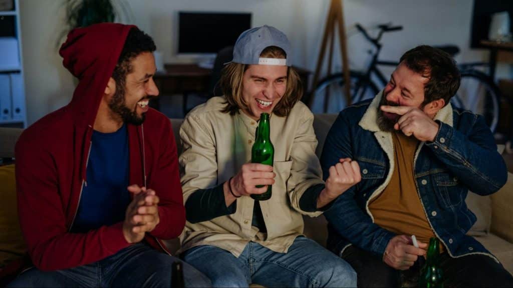 Men talking while drinking
