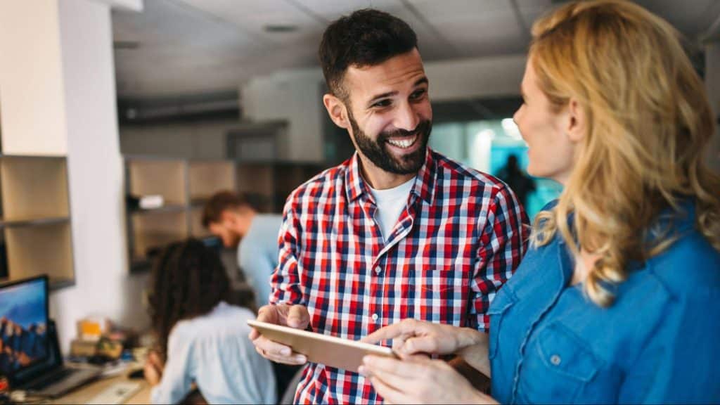 A man and woman talking
