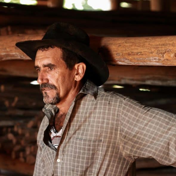 A mature man posing for a photo