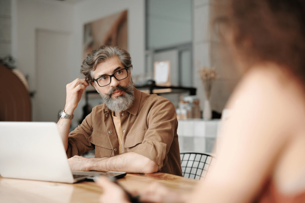 A man and a woman talking